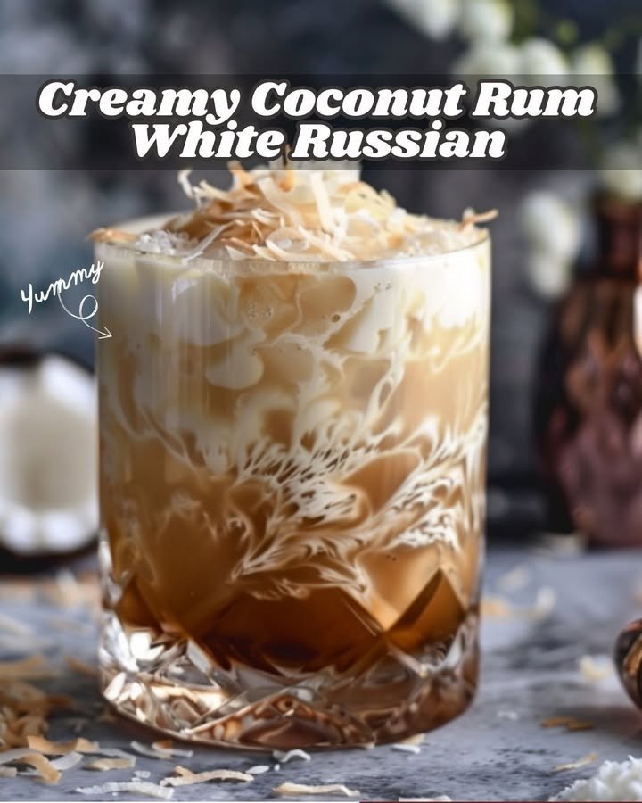 A creamy coconut rum white russian cocktail served in an old fashioned glass