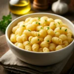 perfectly cooked pastina in a white bowl