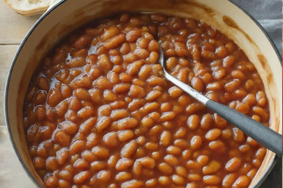 A plate of English-Style Baked Beans in a tomato sauce, typically served with a full English breakfast